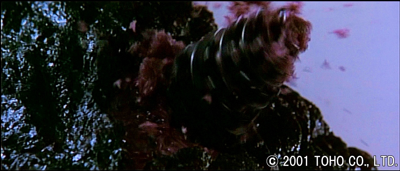 ゴジラの頸部を内部から突き破る削岩弾